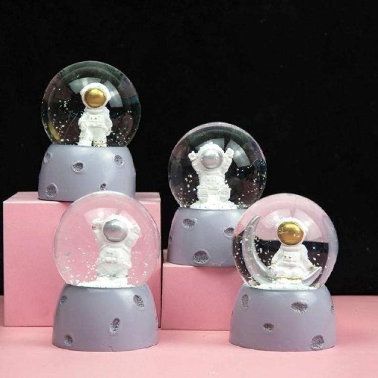 Mini Light-Up Astronaut Snow Globe Mini Light-Up Astronaut Snow Globe